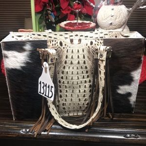 Holy cow couture purse.